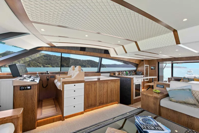 "the Keys" Yacht Photos Pics Luxurious interior of 2021 Custom Valder Yachts Powercat with panoramic windows and modern design.