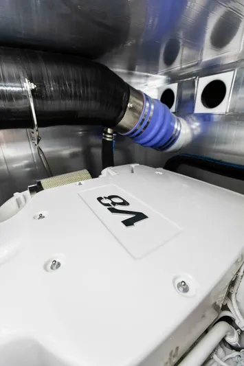 "the Keys" Yacht Photos Pics Engine room of 2021 Valder Yachts Powercat, featuring a V8 engine and ventilation system.