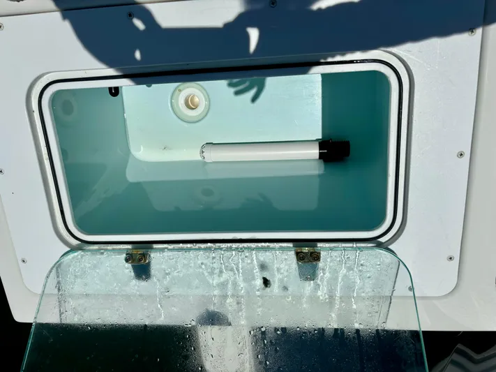  Yacht Photos Pics Parker 2801 Center Console 2022 livewell with open lid and interior view.