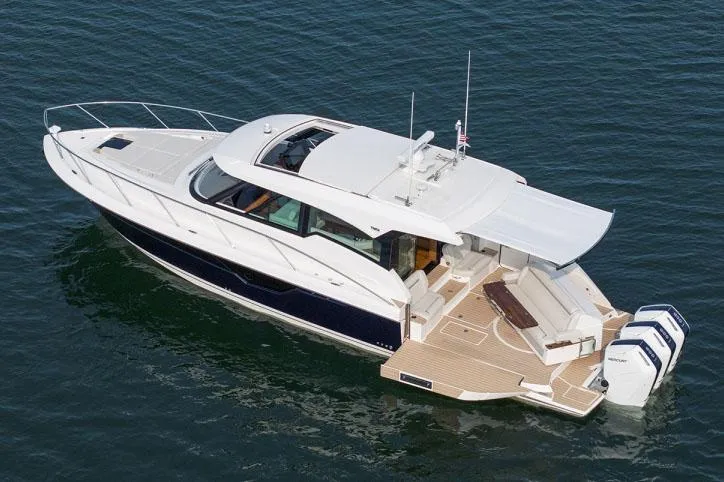  Yacht Photos Pics Manufacturer Provided Image: 2025 Tiara Yachts 48 LE luxury boat on water, showcasing sleek design and spacious deck.