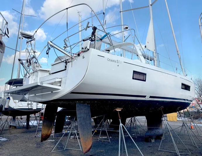Betwixt Yacht Photos Pics 2022 Beneteau Oceanis 51.1 sailboat on stands, ready for maintenance.