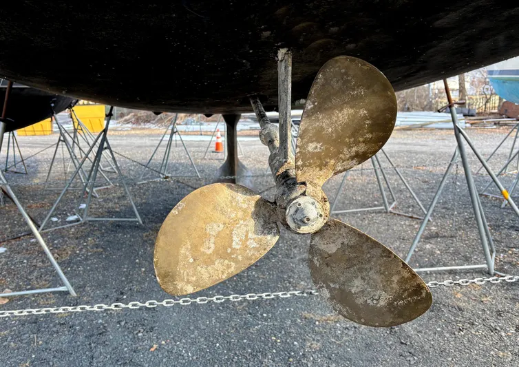 Betwixt Yacht Photos Pics Propeller of 2022 Beneteau Oceanis 51.1 sailboat on dry dock.