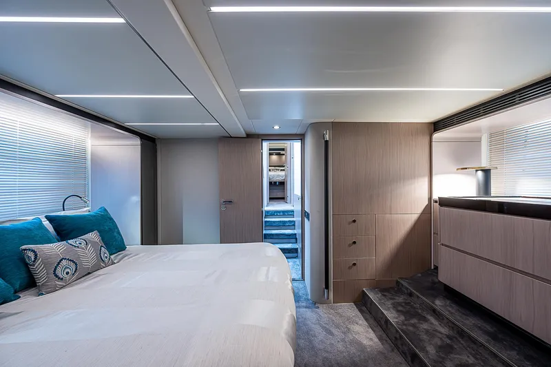 Liquid Asset Yacht Photos Pics Luxurious interior of 2020 Azimut 66 yacht with modern bedroom design.