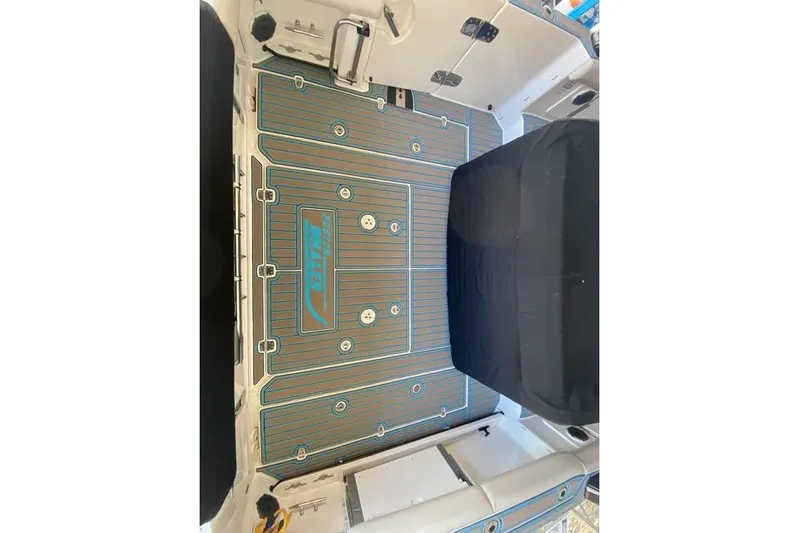 Fast Money Yacht Photos Pics 2021 Boston Whaler 420 Outrage boat deck with custom flooring and seating.