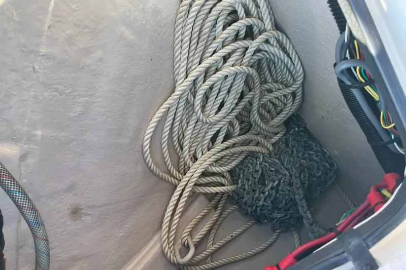 Jus A Lil' Yacht Photos Pics Coiled rope and chain in a 2003 Searay 380 boat compartment.