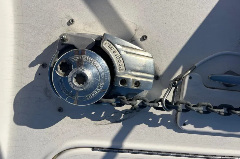 Jus A Lil' Yacht Photos Pics Anchor windlass on 2003 Searay 380 boat deck with chain.