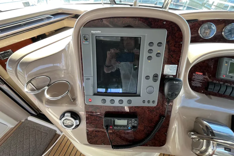 Jus A Lil' Yacht Photos Pics Control panel of a 2003 Searay 380 boat with navigation equipment.