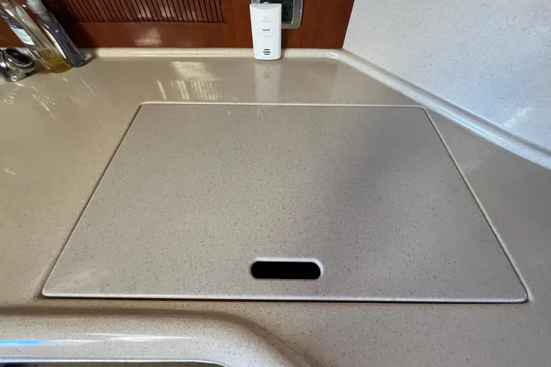 Jus A Lil' Yacht Photos Pics 2003 Searay 380 yacht kitchen countertop with integrated stove cover.