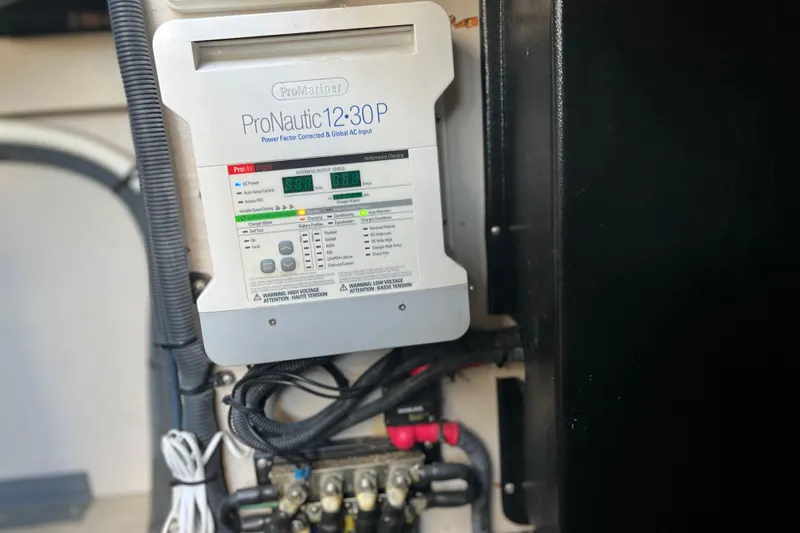 Jus A Lil' Yacht Photos Pics ProNautic 12:30P charger in 2003 Searay 380 boat, showing control panel and wiring.