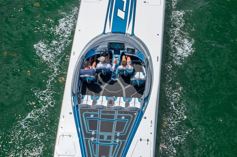  Yacht Photos Pics Overhead view of 2024 MTI 440X speedboat cruising on water.