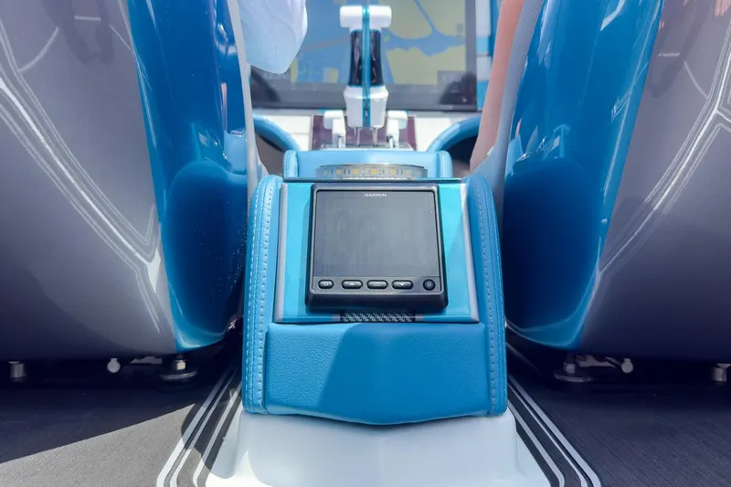  Yacht Photos Pics Interior of 2024 MTI 440X boat with blue seating and navigation display.