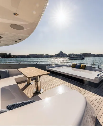 Doge 400 Yacht Photos Pics Luxurious Ocean King Doge 400 yacht deck with seating, table, and scenic ocean view, 2027 model.