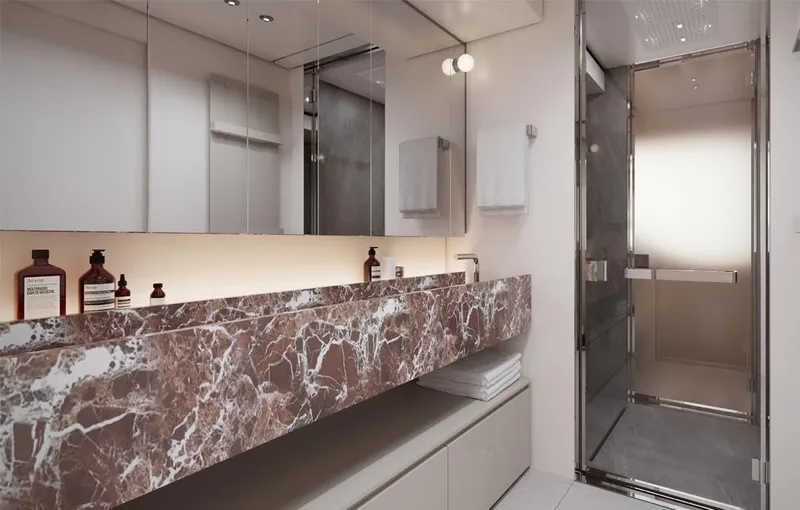 Doge 400 Yacht Photos Pics Luxurious yacht bathroom with marble countertop, modern fixtures, and glass shower in Ocean King Doge 400.