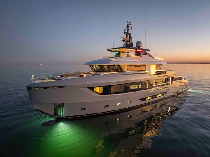 Doge 400 Yacht Photos Pics Luxurious Ocean King Doge 400 yacht, 2027 model, illuminated on calm waters at sunset.