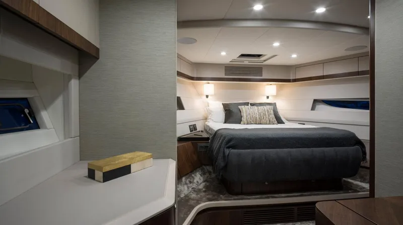  Yacht Photos Pics Luxurious interior of 2026 Fairline Phantom 65 yacht bedroom with modern design.