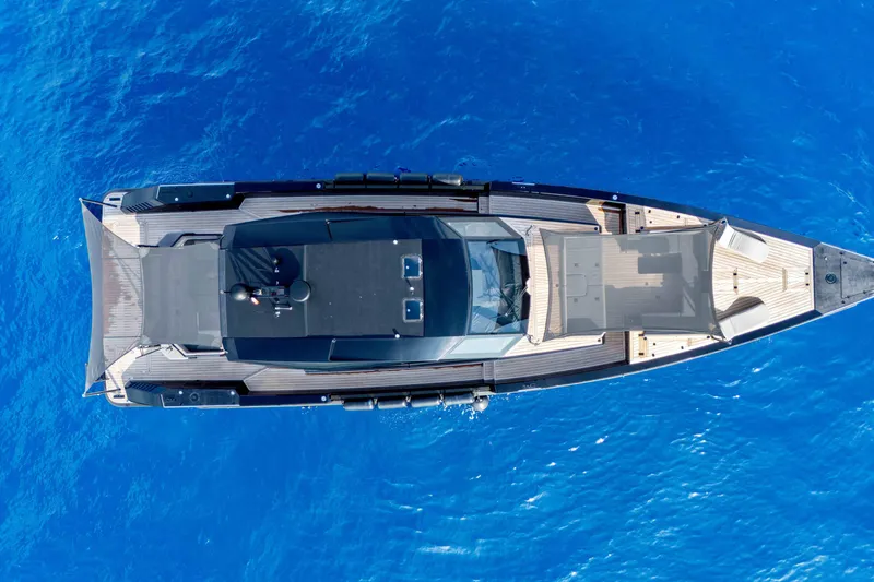 Matariki Yacht Photos Pics Aerial view of 2014 Maori 78 yacht on vibrant blue ocean.