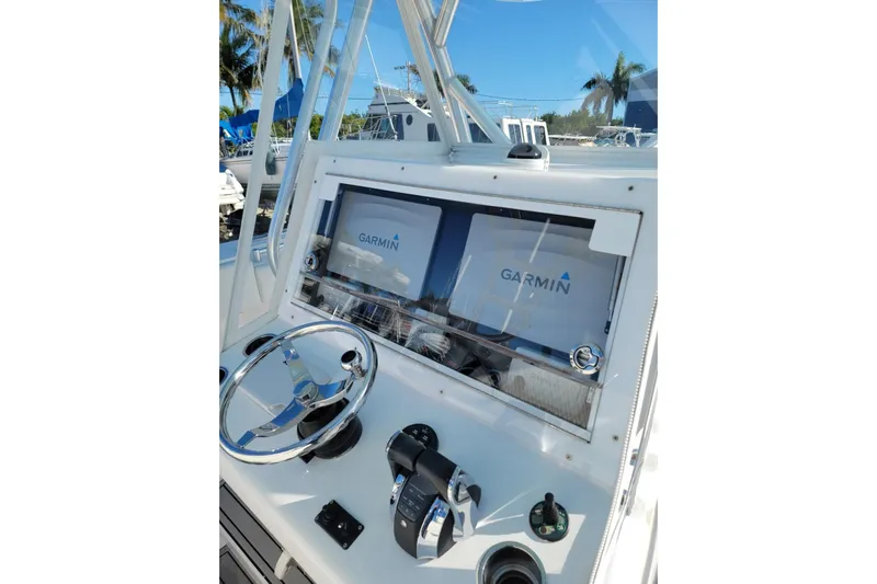  Yacht Photos Pics 2017 Sea Hunter 39 boat dashboard with Garmin navigation system and steering wheel.