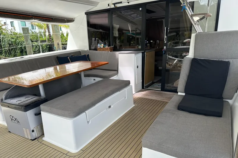 Big Enough Yacht Photos Pics Spacious 2014 Fountaine Pajot Helia 44 catamaran cockpit with comfortable seating and dining area.