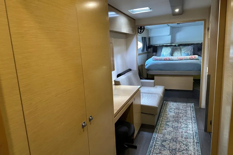 Big Enough Yacht Photos Pics Interior of 2014 Fountaine Pajot Helia 44 catamaran with cozy bedroom and seating area.