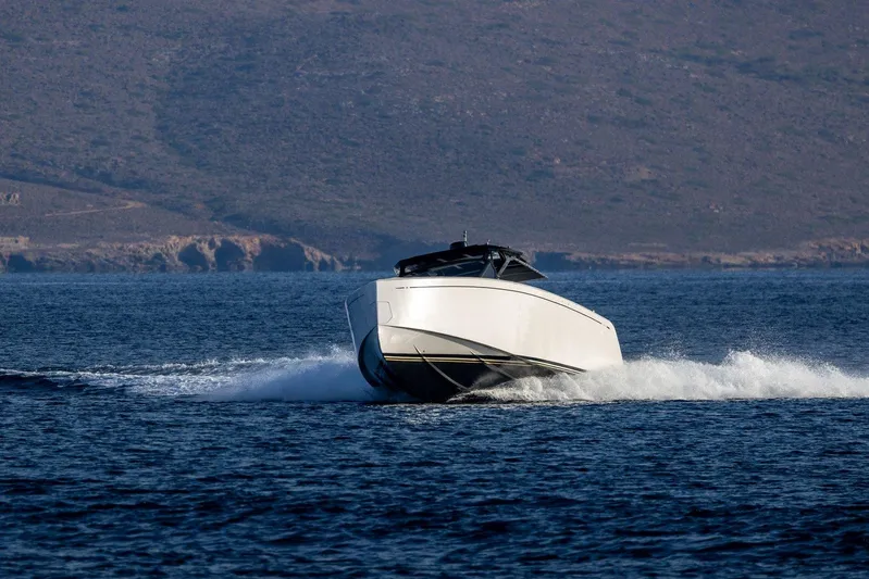 M/y Ida Yacht Photos Pics 2021 Pardo Yachts 50 cruising on open water with scenic mountain backdrop.