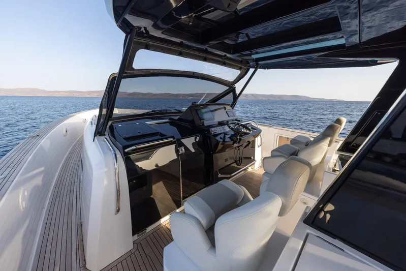 M/y Ida Yacht Photos Pics Luxury Pardo Yachts 50 cockpit with modern controls, 2021 model, cruising on open water.