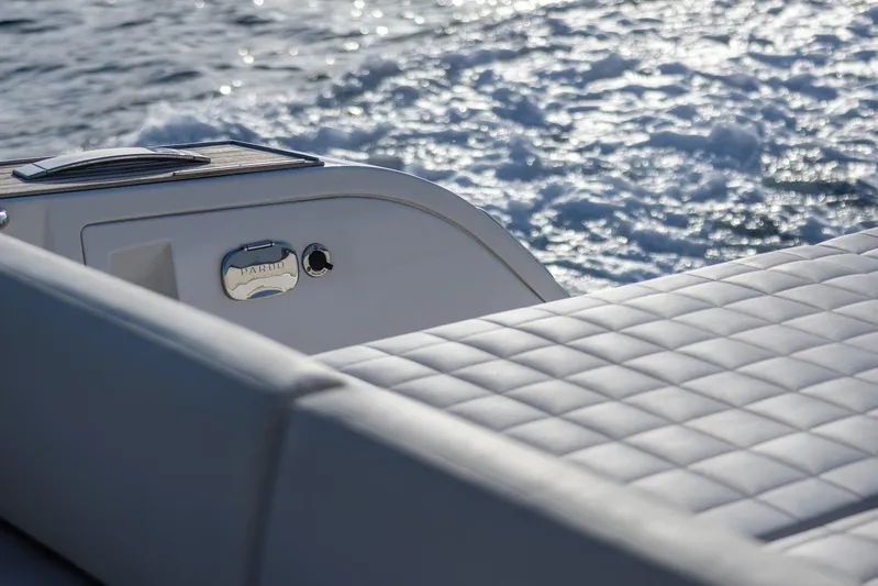 M/y Ida Yacht Photos Pics Luxury seating on 2021 Pardo Yachts 50, with ocean waves in the background.