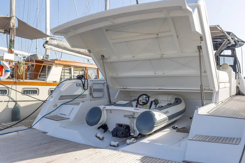 M/y Ida Yacht Photos Pics 2021 Pardo Yachts 50 with open storage compartment and inflatable boat on deck.