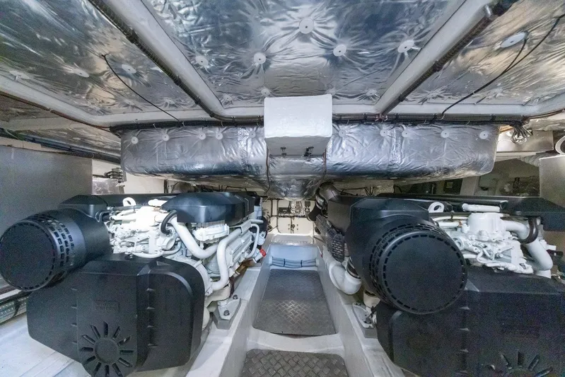 M/y Ida Yacht Photos Pics Engine room of 2021 Pardo Yachts 50, featuring dual engines and insulated ceiling.