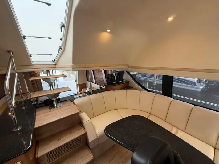  Yacht Photos Pics Interior of 2002 Carver 530 Voyager Pilothouse with elegant seating and modern design.