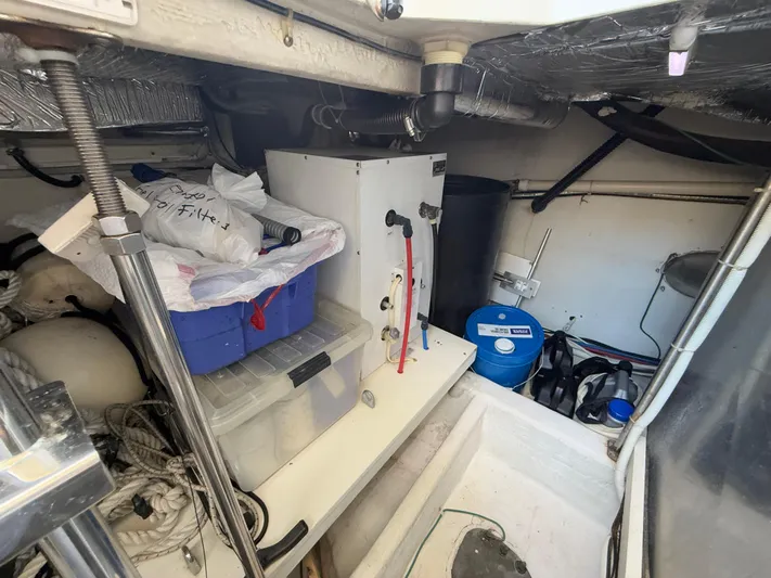  Yacht Photos Pics Engine room of 2002 Carver 530 Voyager Pilothouse with storage and equipment.