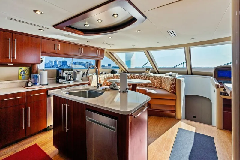 Summerwind Yacht Photos Pics Luxurious 2005 Lazzara 80 yacht interior with modern kitchen and panoramic windows.