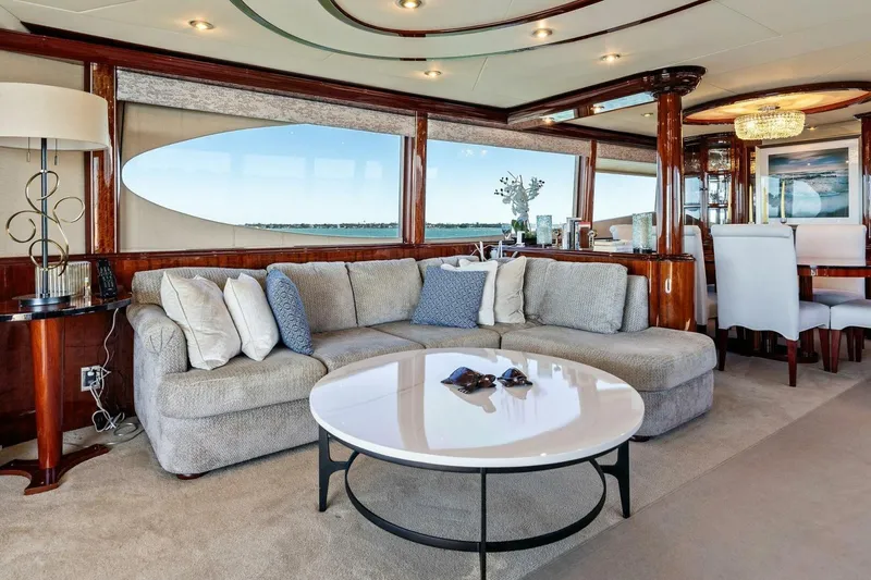 Summerwind Yacht Photos Pics Luxurious interior of 2005 Lazarra 80 yacht with elegant seating and dining area.