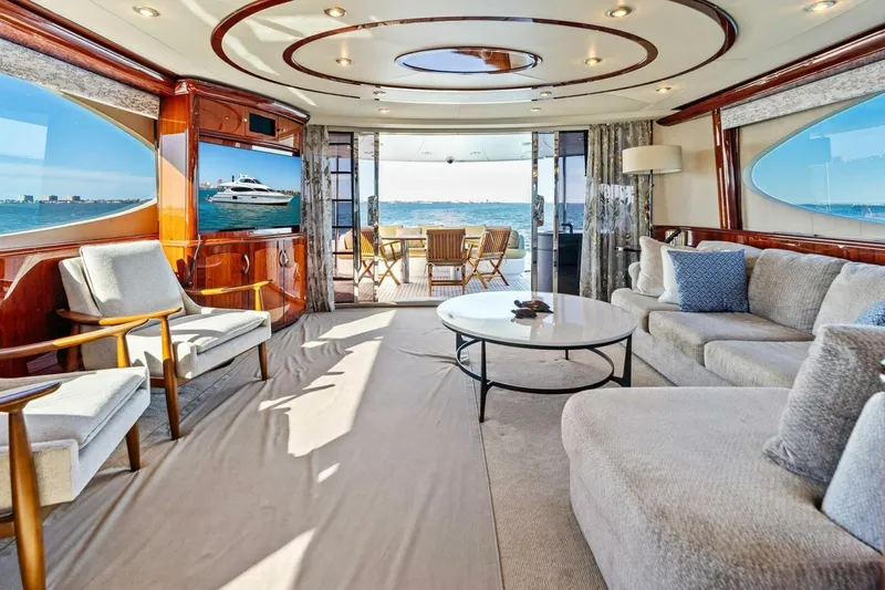 Summerwind Yacht Photos Pics Luxurious 2005 Lazarra 80 yacht interior with elegant seating and ocean view.