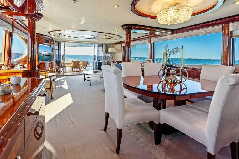 Summerwind Yacht Photos Pics Luxurious interior of 2005 Lazarra 80 yacht with elegant dining area and ocean view.