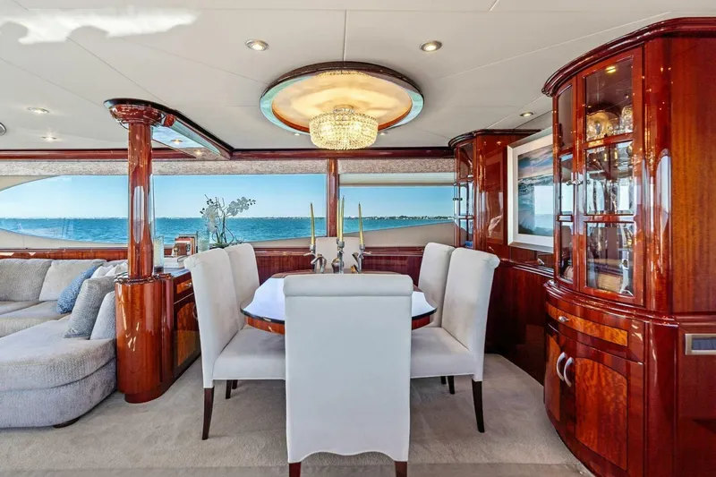 Summerwind Yacht Photos Pics Luxurious interior of 2005 Lazarra 80 yacht with elegant dining area and ocean view.