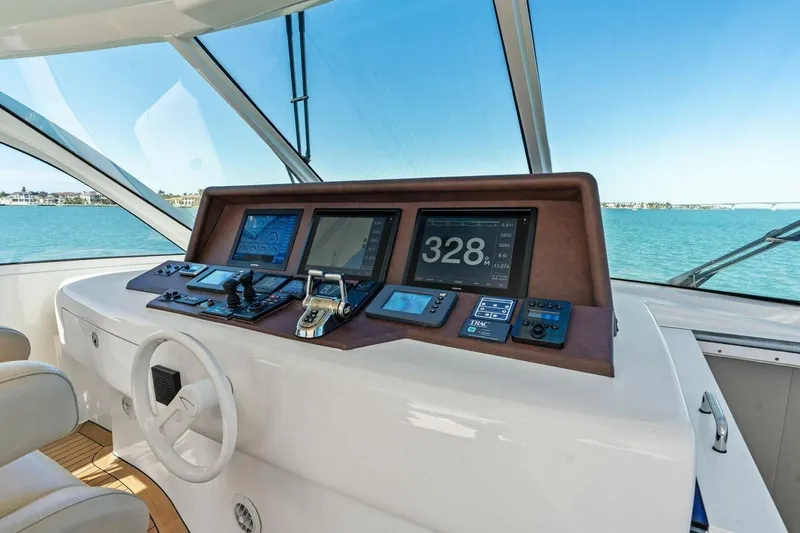 Summerwind Yacht Photos Pics Helm of 2005 Lazarra 80 yacht with advanced navigation displays and controls.
