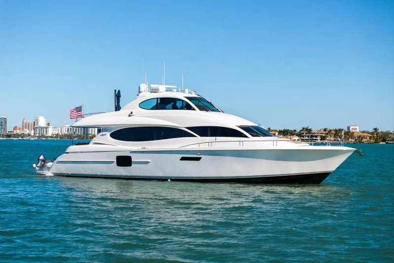 Summerwind Yacht Photos Pics Luxury 2005 Lazarra 80 yacht cruising on clear blue waters.