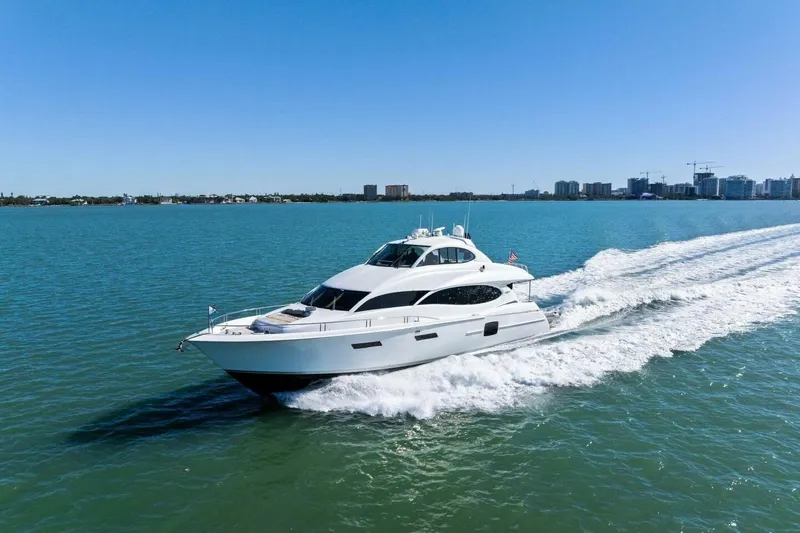 Summerwind Yacht Photos Pics Luxury 2005 Lazarra 80 yacht cruising on clear blue waters.