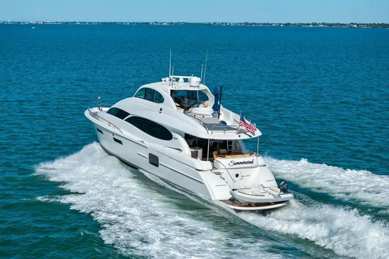 Summerwind Yacht Photos Pics Luxury 2005 Lazarra 80 yacht cruising on open blue waters.