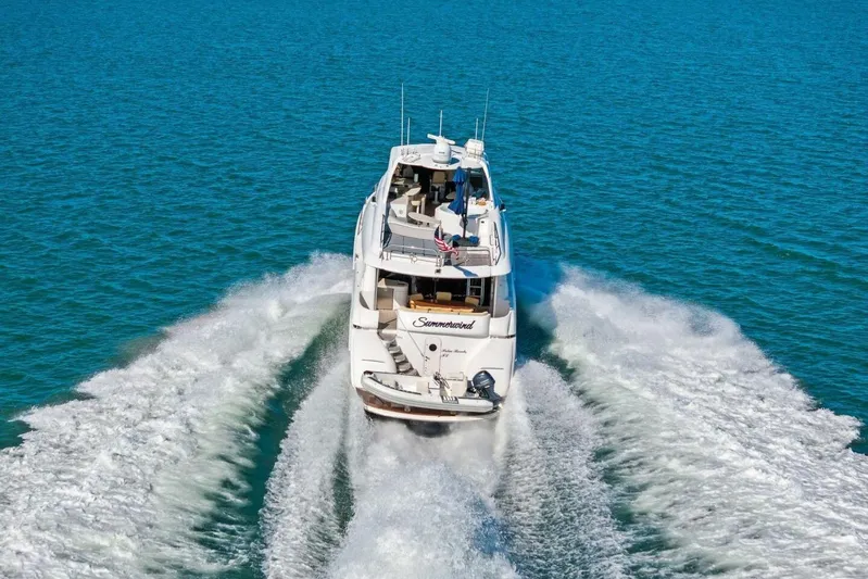 Summerwind Yacht Photos Pics Luxury 2005 Lazarra 80 yacht cruising on open blue sea.