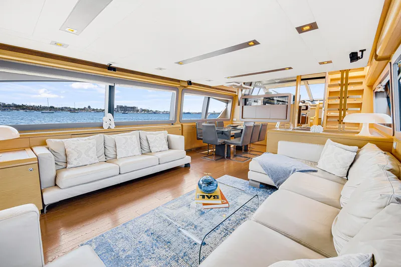 Papaito Yacht Photos Pics Luxurious interior of 2013 Ferretti Yachts 800 with elegant seating and panoramic windows.