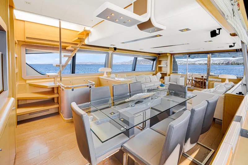 Papaito Yacht Photos Pics Luxurious interior of 2013 Ferretti Yachts 800 with elegant dining and seating area.