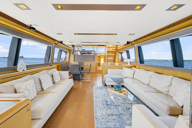 Papaito Yacht Photos Pics Luxurious interior of 2013 Ferretti Yachts 800 with elegant seating and panoramic windows.