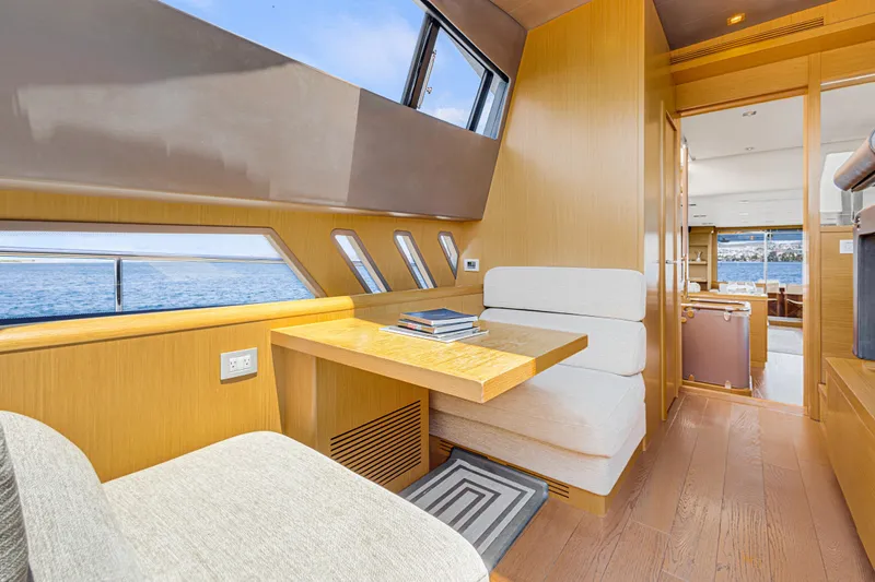 Papaito Yacht Photos Pics Luxurious interior of 2013 Ferretti Yachts 800 with elegant seating and ocean view.