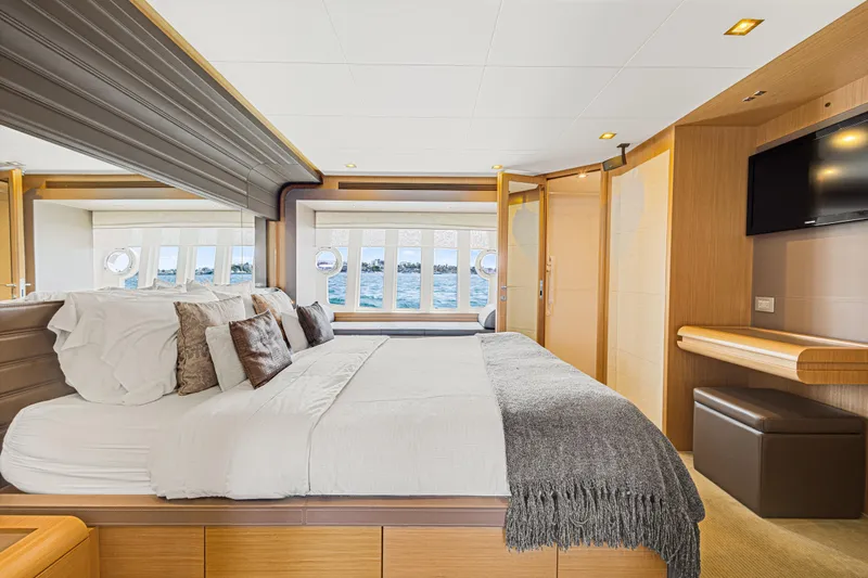 Papaito Yacht Photos Pics Luxurious bedroom interior of 2013 Ferretti Yachts 800 with ocean view and modern amenities.