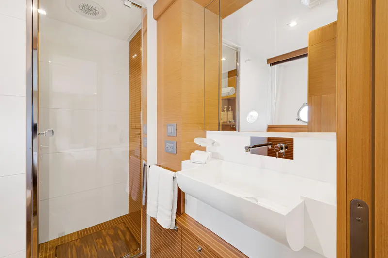 Papaito Yacht Photos Pics Luxurious bathroom interior on 2013 Ferretti Yachts 800, featuring modern sink and shower.