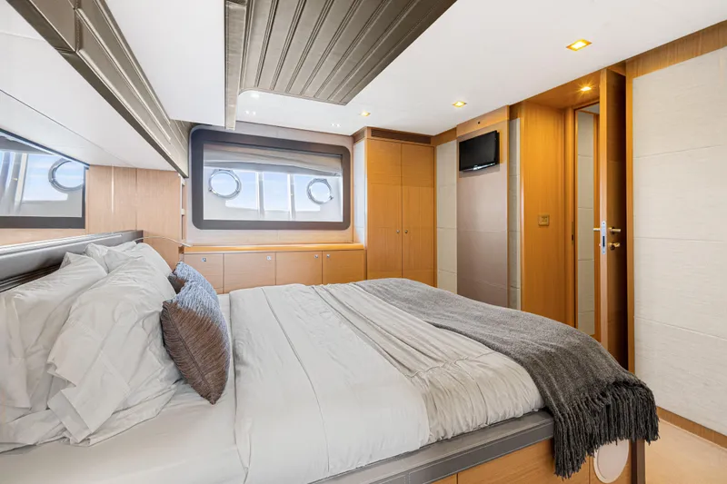 Papaito Yacht Photos Pics Luxurious bedroom interior of 2013 Ferretti Yachts 800, featuring elegant design and modern amenities.