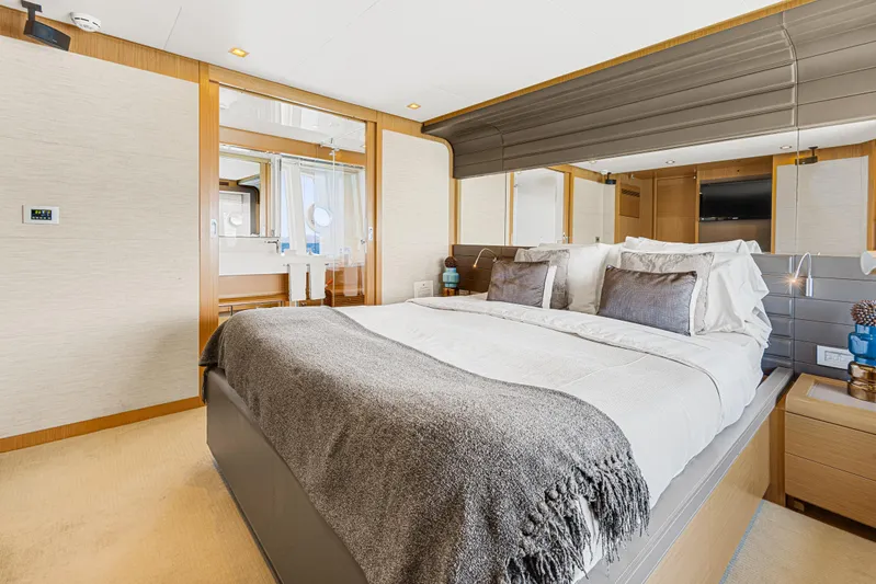 Papaito Yacht Photos Pics Luxurious bedroom interior on 2013 Ferretti Yachts 800, featuring elegant bedding and modern design.