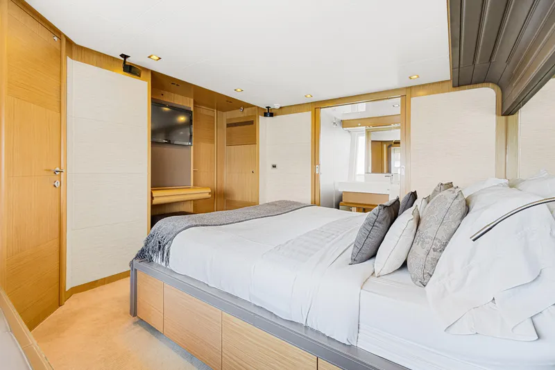 Papaito Yacht Photos Pics Luxurious bedroom interior of 2013 Ferretti Yachts 800, featuring elegant design and modern amenities.