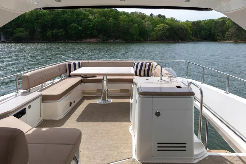 Janie Yacht Photos Pics Luxurious 2018 Sea Ray L650 Fly yacht deck with seating and scenic water view.